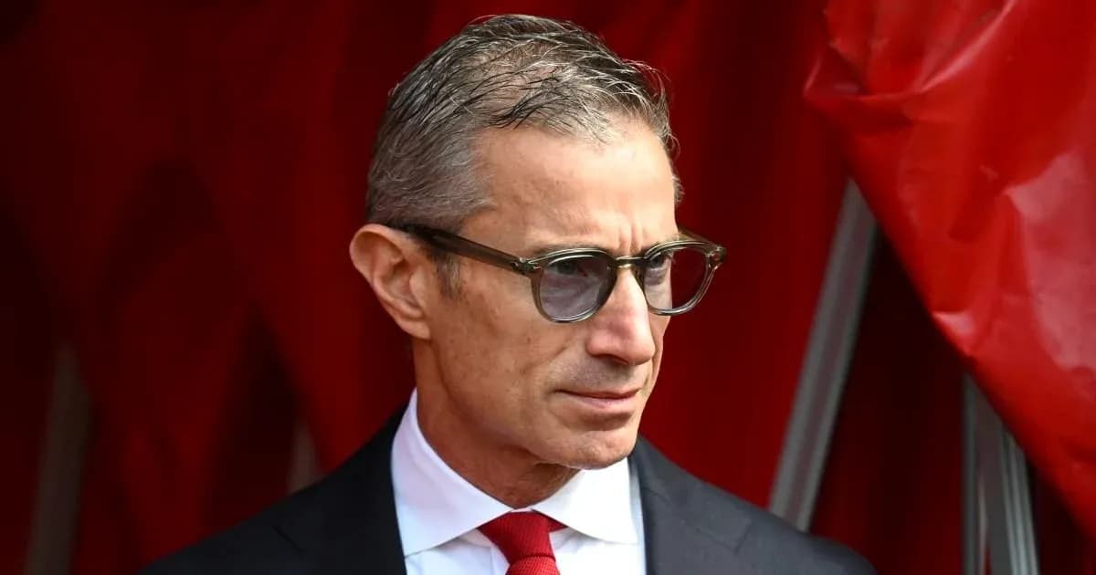 Man wearing glasses in front of red backdrop Man wearing glasses in front of red backdrop