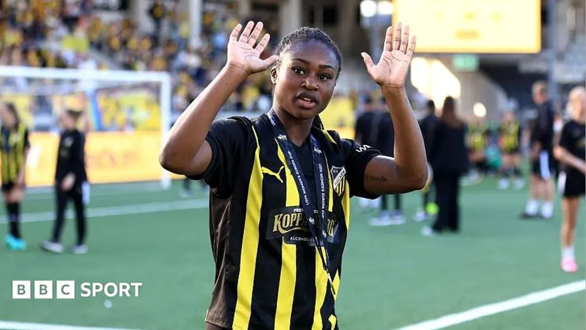 Player waving on the field after a match Player waving on the field after a match