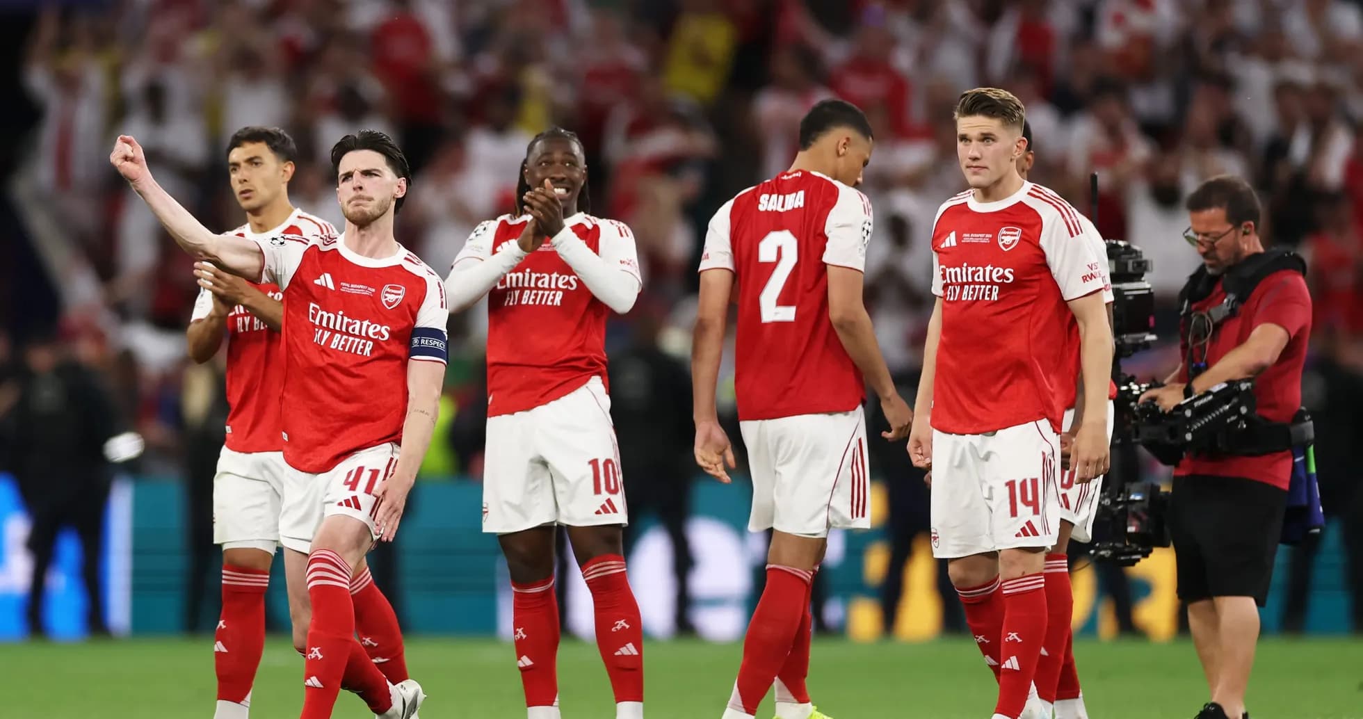 Arsenal players on field after match celebration Arsenal players on field after match celebration