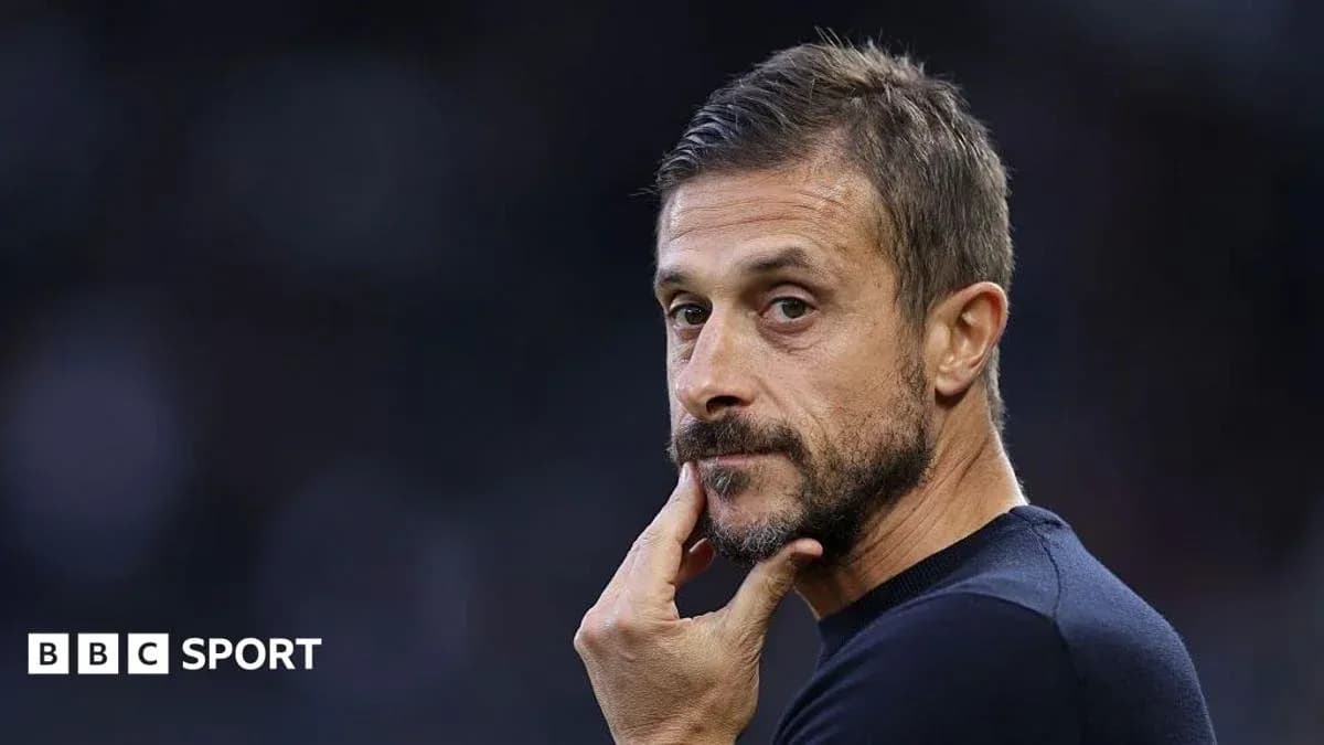 Coach contemplating during a match Coach contemplating during a match