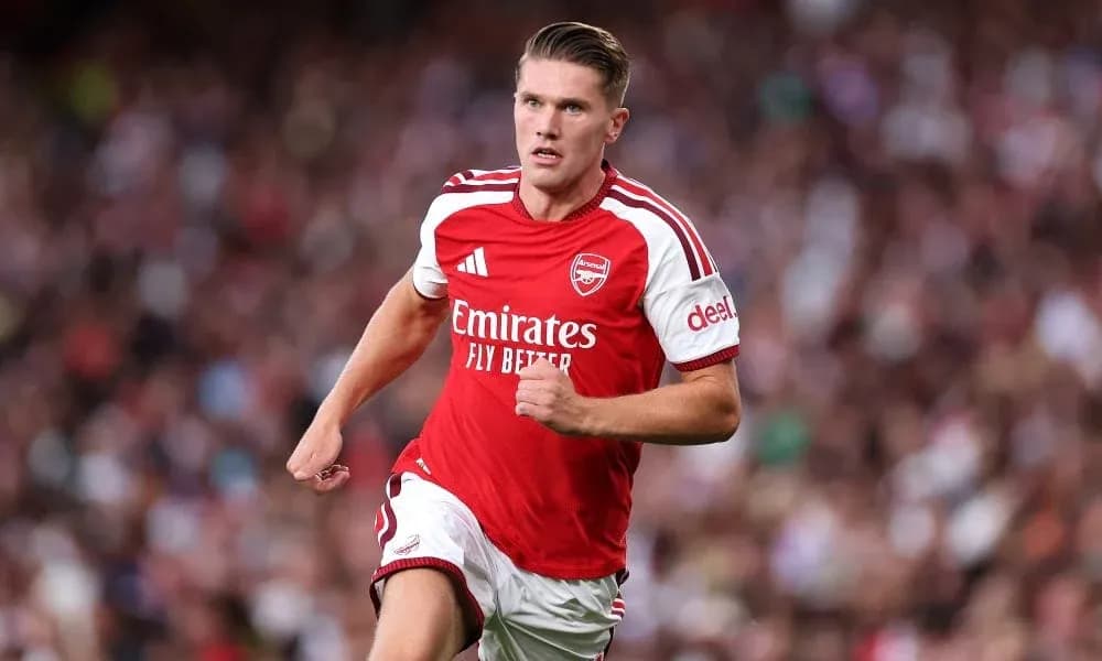 Arsenal player running during a match Arsenal player running during a match