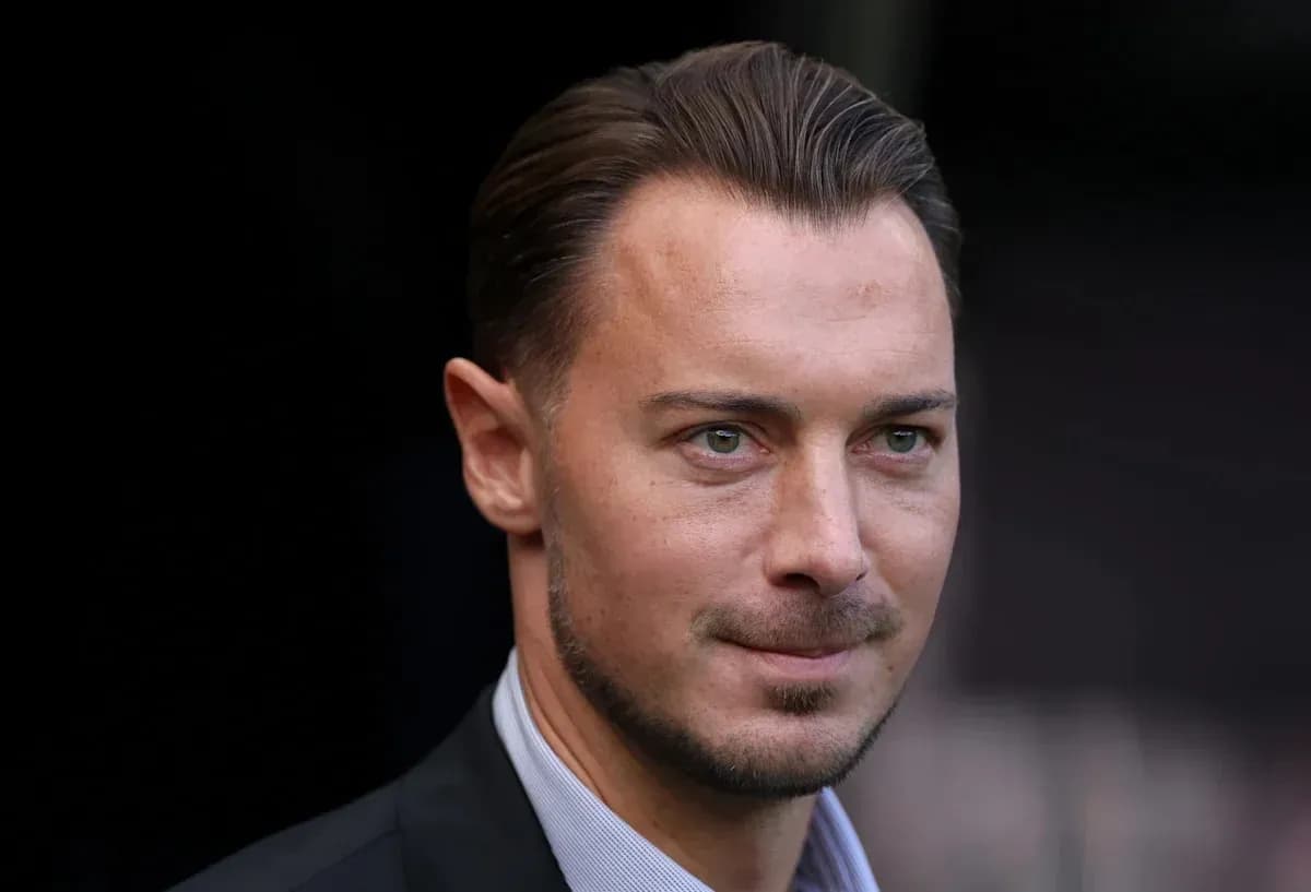 Man in suit with short hair and facial hair Man in suit with short hair and facial hair