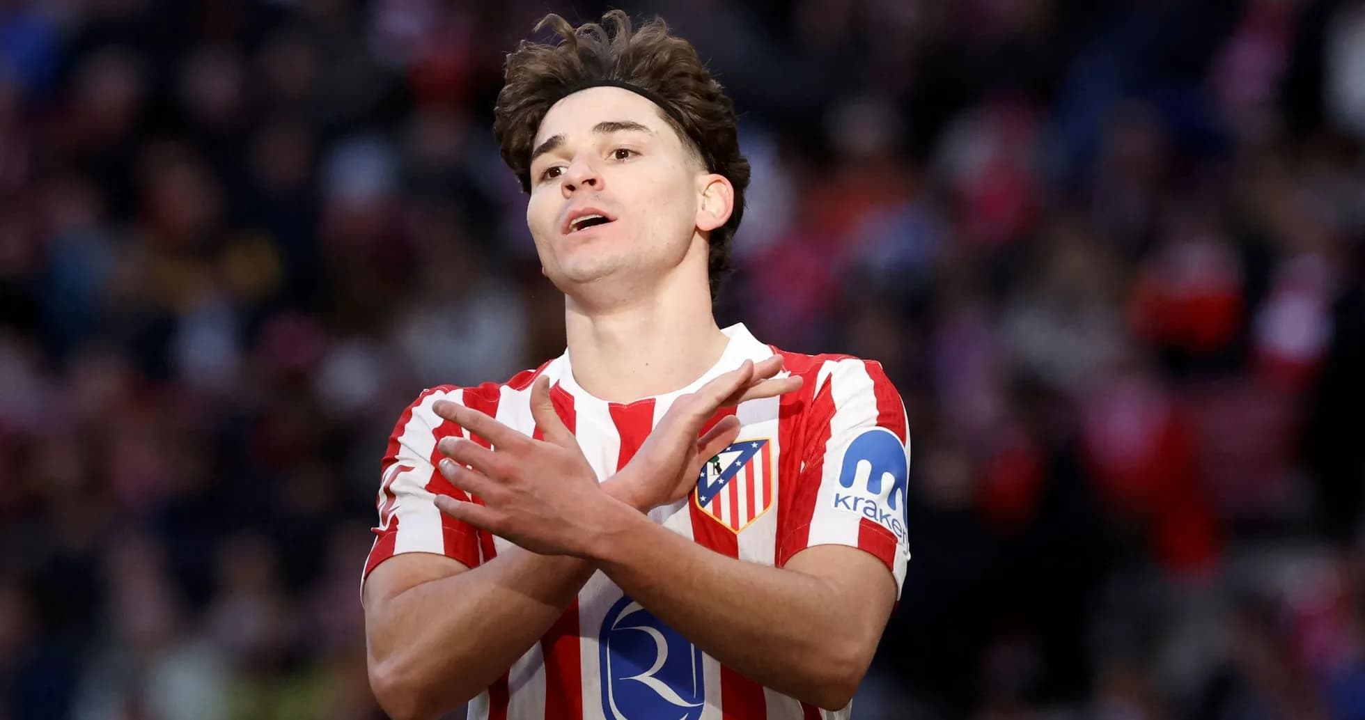 Atletico Madrid player gesturing during match Atletico Madrid player gesturing during match