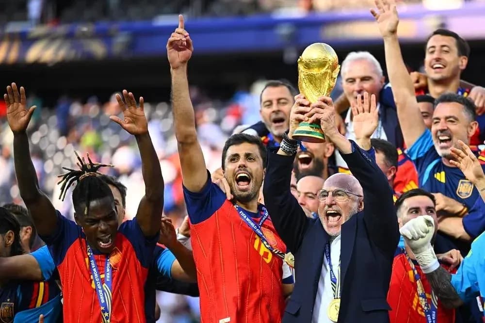 Team celebrating with FIFA World Cup trophy Team celebrating with FIFA World Cup trophy