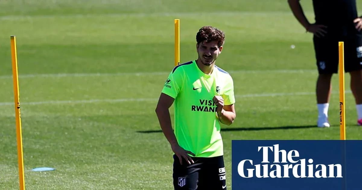 Player training on pitch with agility poles Player training on pitch with agility poles