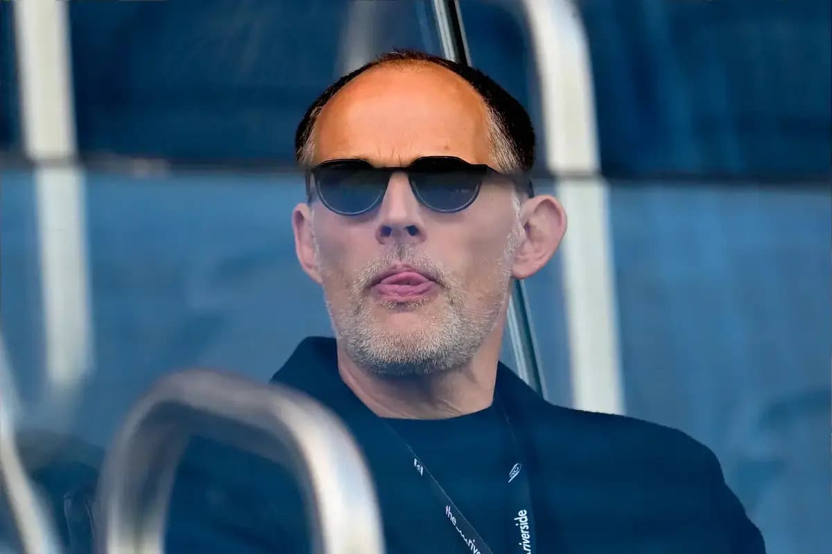 Man in sunglasses watching from a balcony Man in sunglasses watching from a balcony