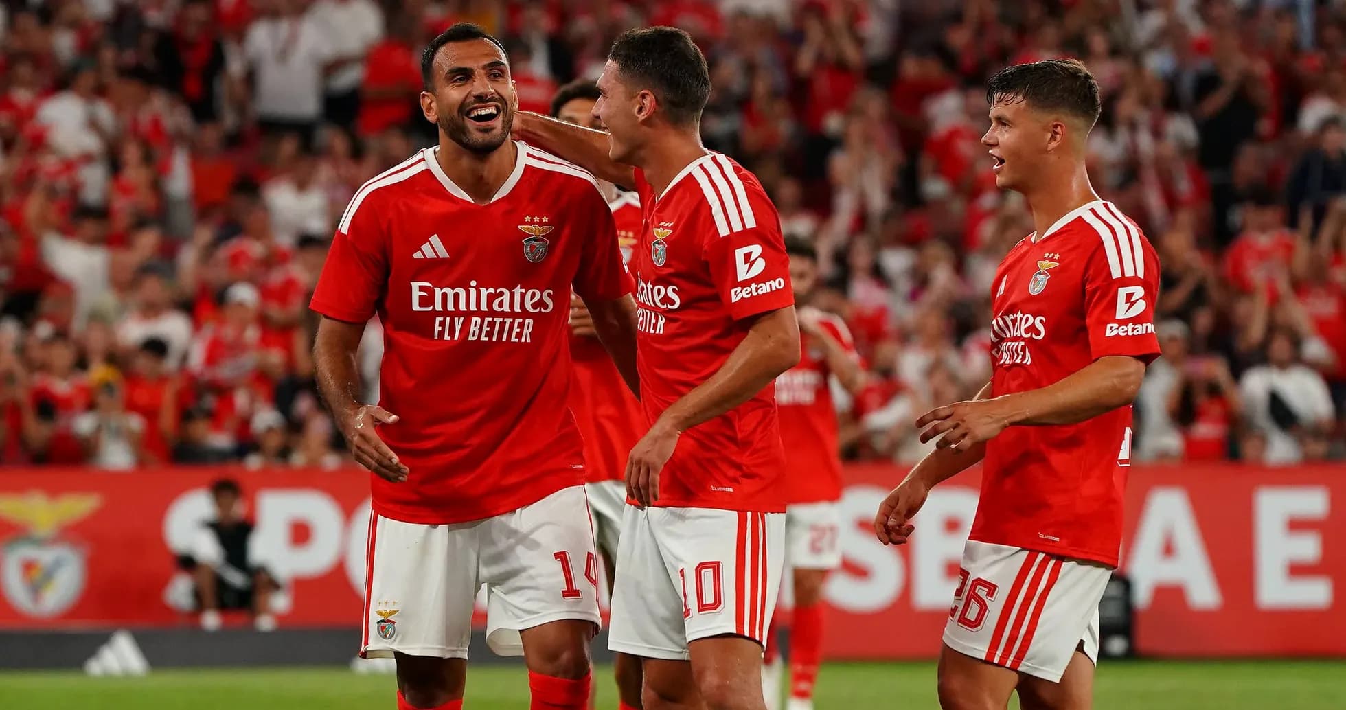 Benfica players celebrating a goal in match Benfica players celebrating a goal in match