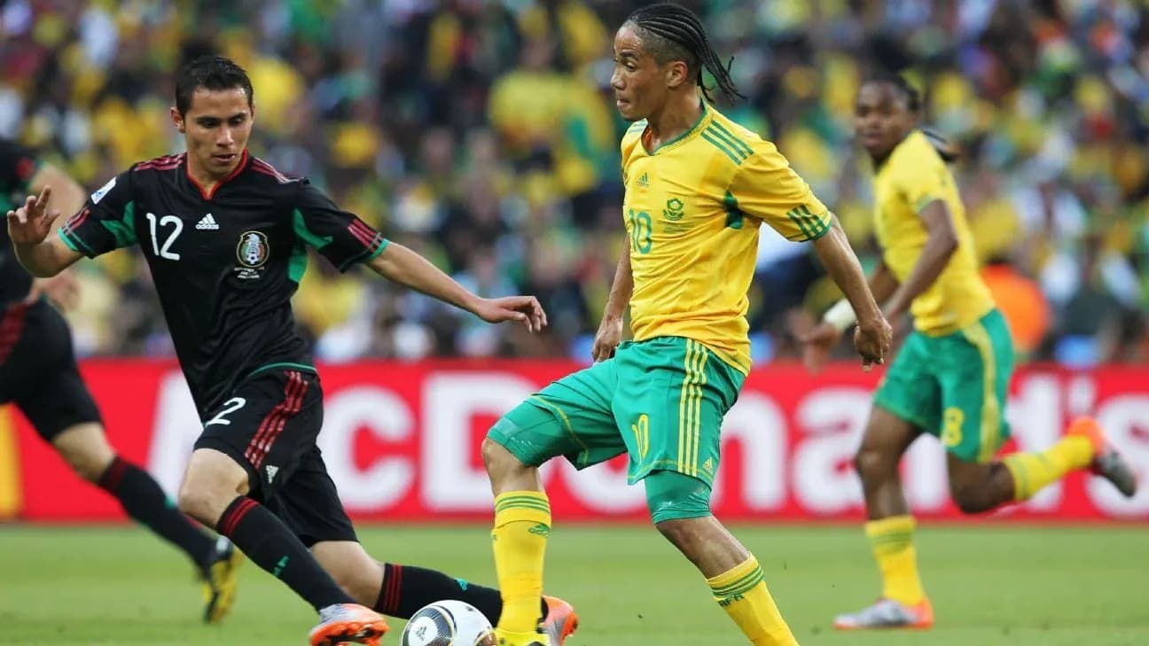 Player dribbling the ball during a match Player dribbling the ball during a match