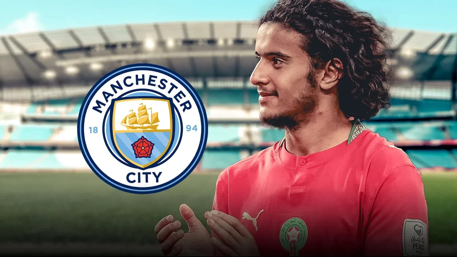 Player in Manchester City kit at stadium Player in Manchester City kit at stadium