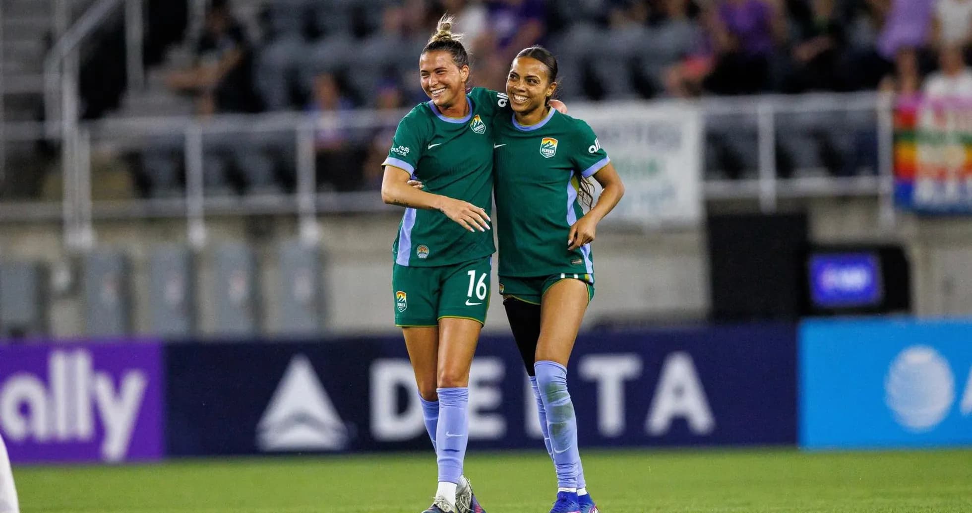 Players celebrating during NWSL match Players celebrating during NWSL match