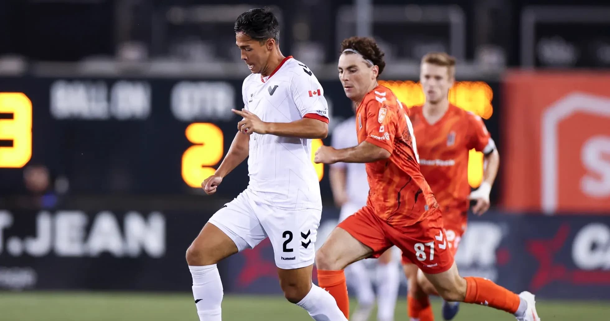 Vancouver FC player dribbling against Forge FC Vancouver FC player dribbling against Forge FC