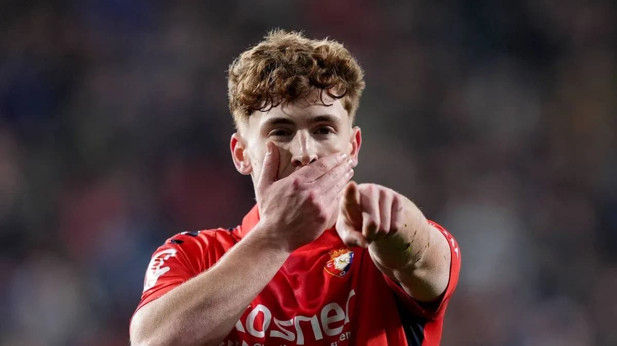 Player celebrating and pointing during match action Player celebrating and pointing during match action