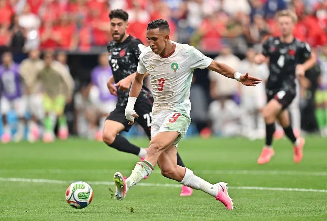 Moroccan player kicking the ball during match Moroccan player kicking the ball during match