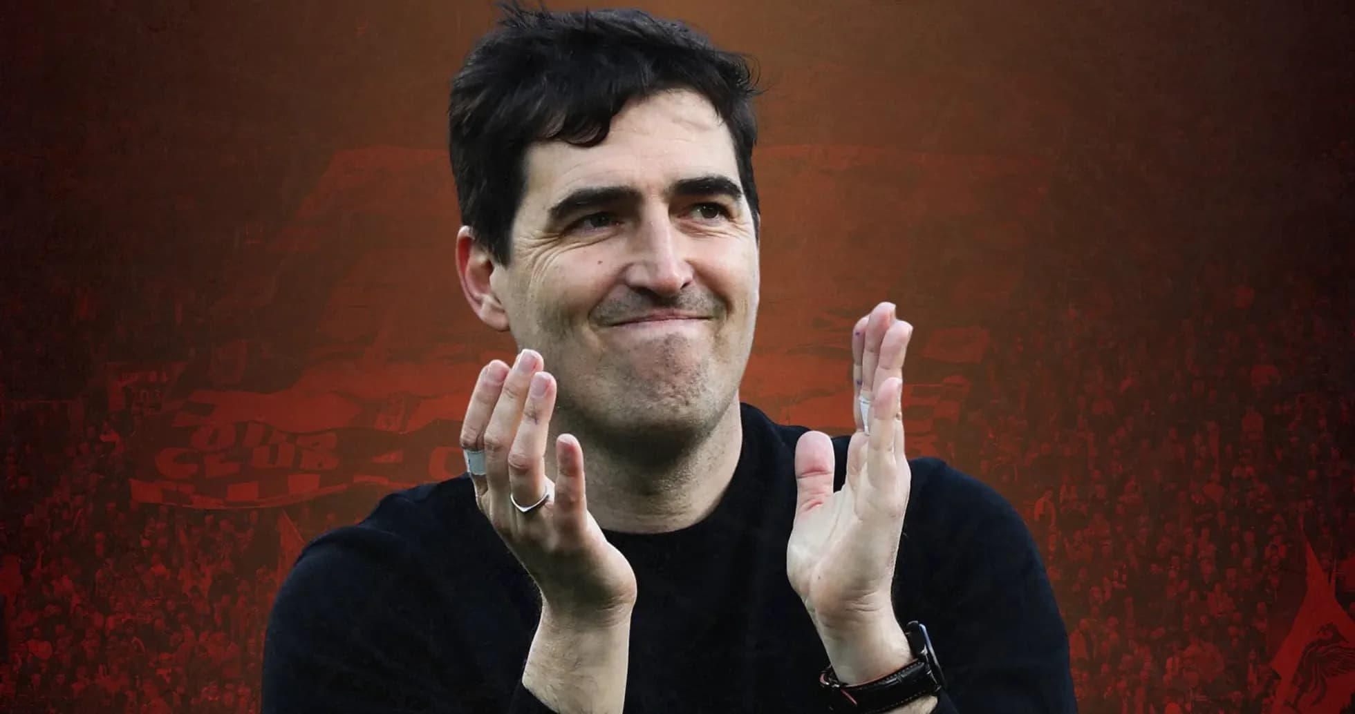 Coach applauding fans in stadium during match Coach applauding fans in stadium during match