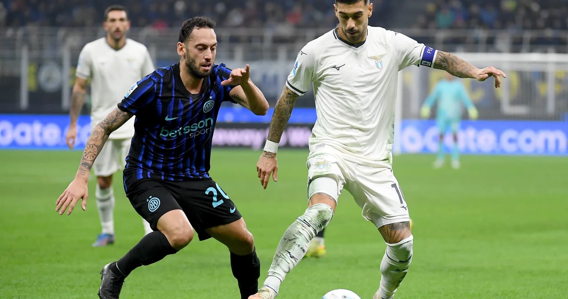 Lazio player dribbling past Inter defender Lazio player dribbling past Inter defender