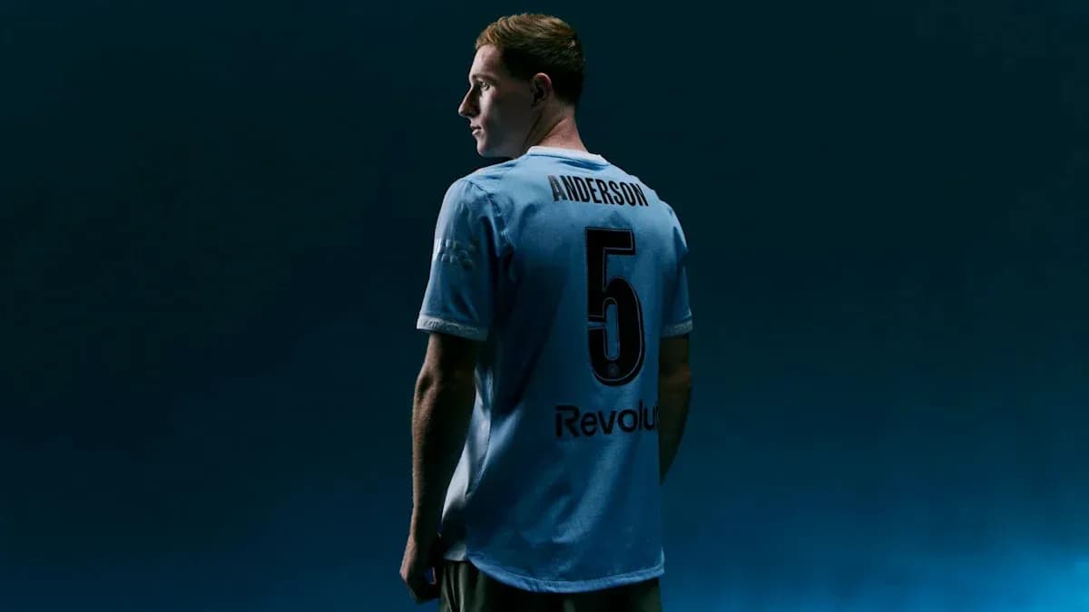 Player wearing light blue jersey with 'Anderson' and number 5 Player wearing light blue jersey with 'Anderson' and number 5