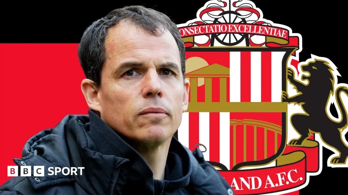 Manager in front of Sunderland AFC logo backdrop Manager in front of Sunderland AFC logo backdrop