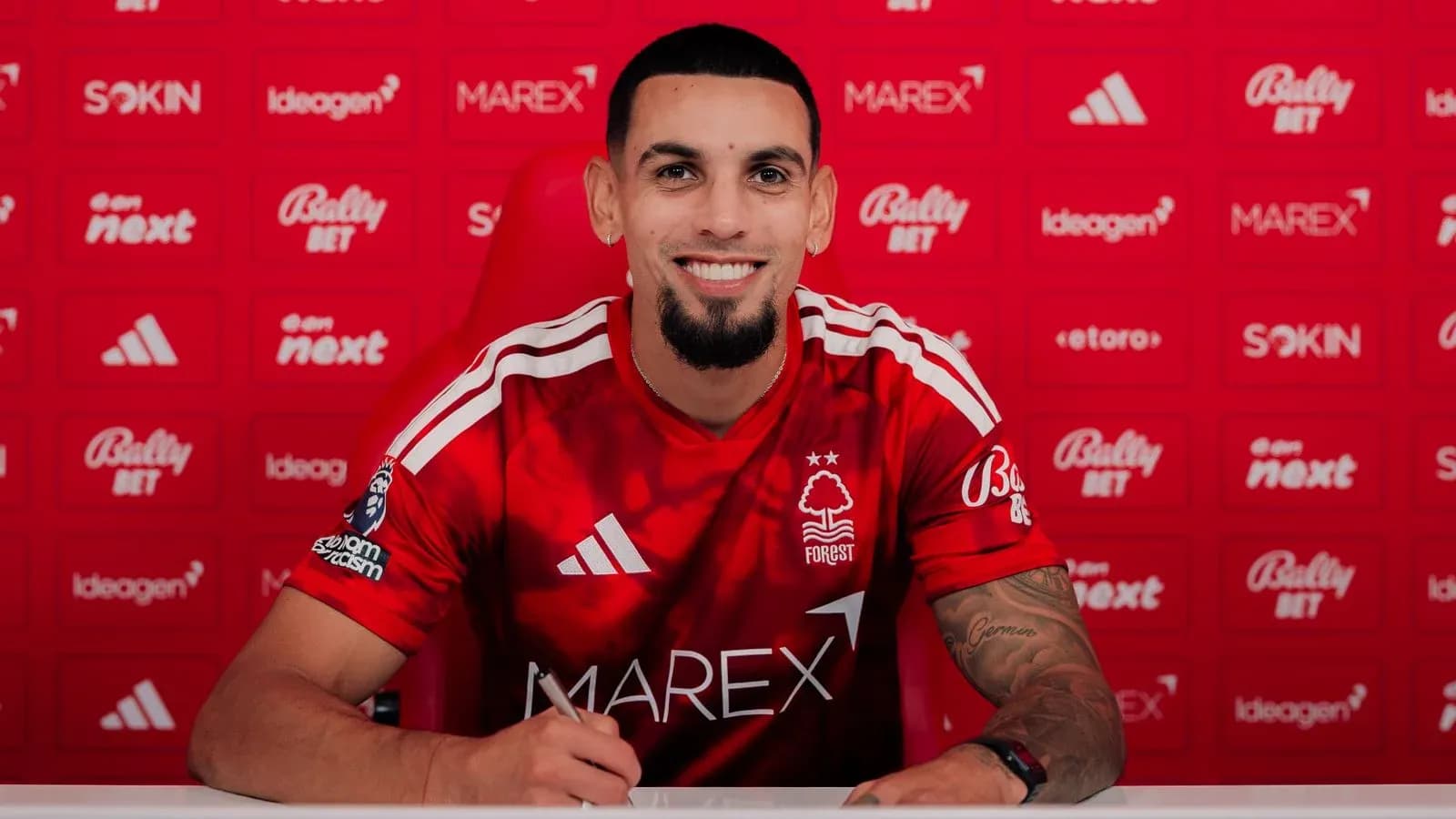 Player signing contract at Nottingham Forest press event Player signing contract at Nottingham Forest press event