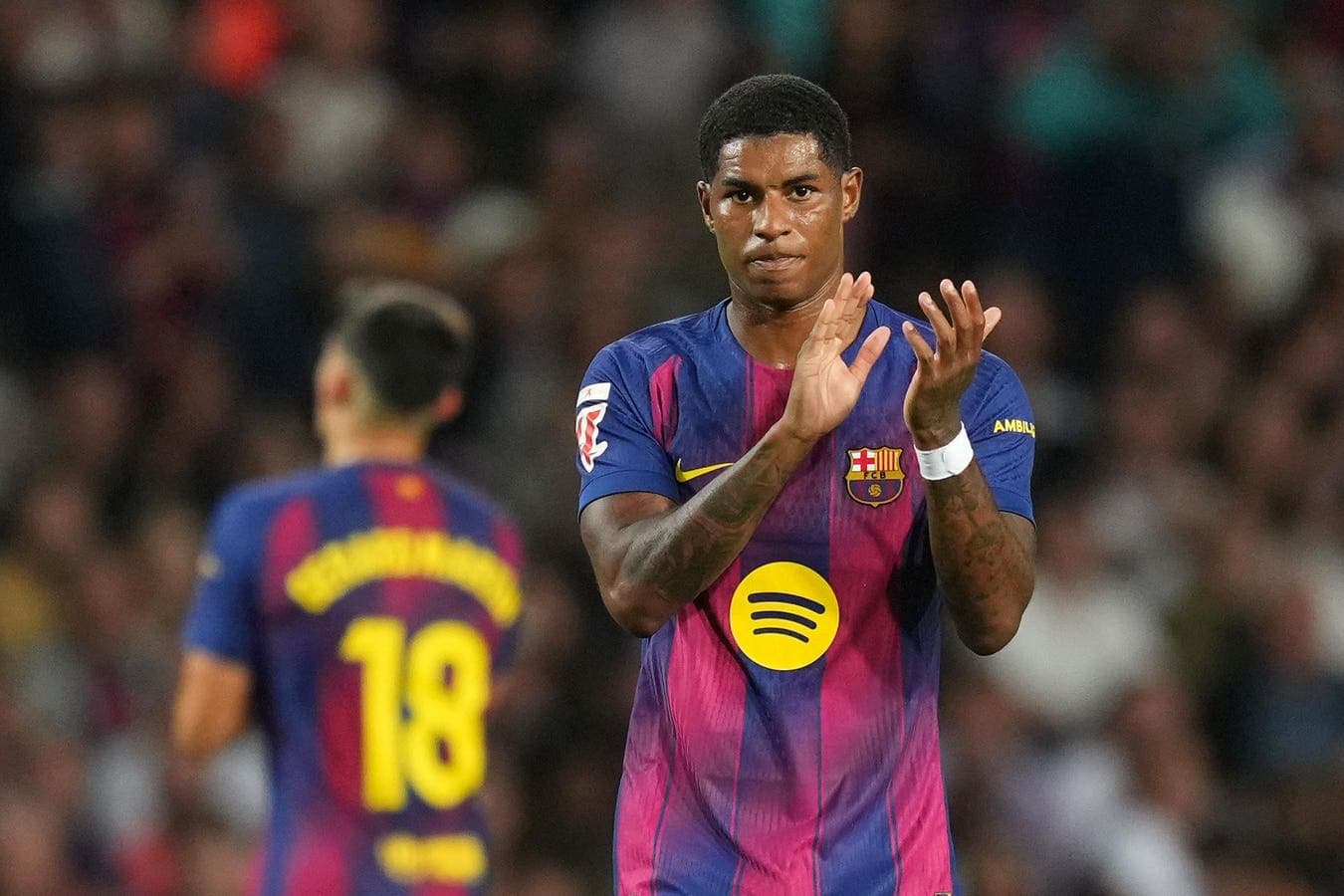 Barcelona player applauding during match celebration Barcelona player applauding during match celebration