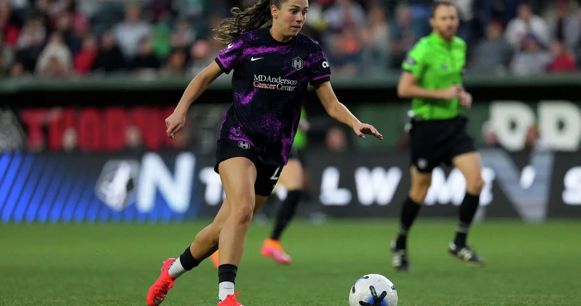 Houston Dash player dribbling the ball during match Houston Dash player dribbling the ball during match