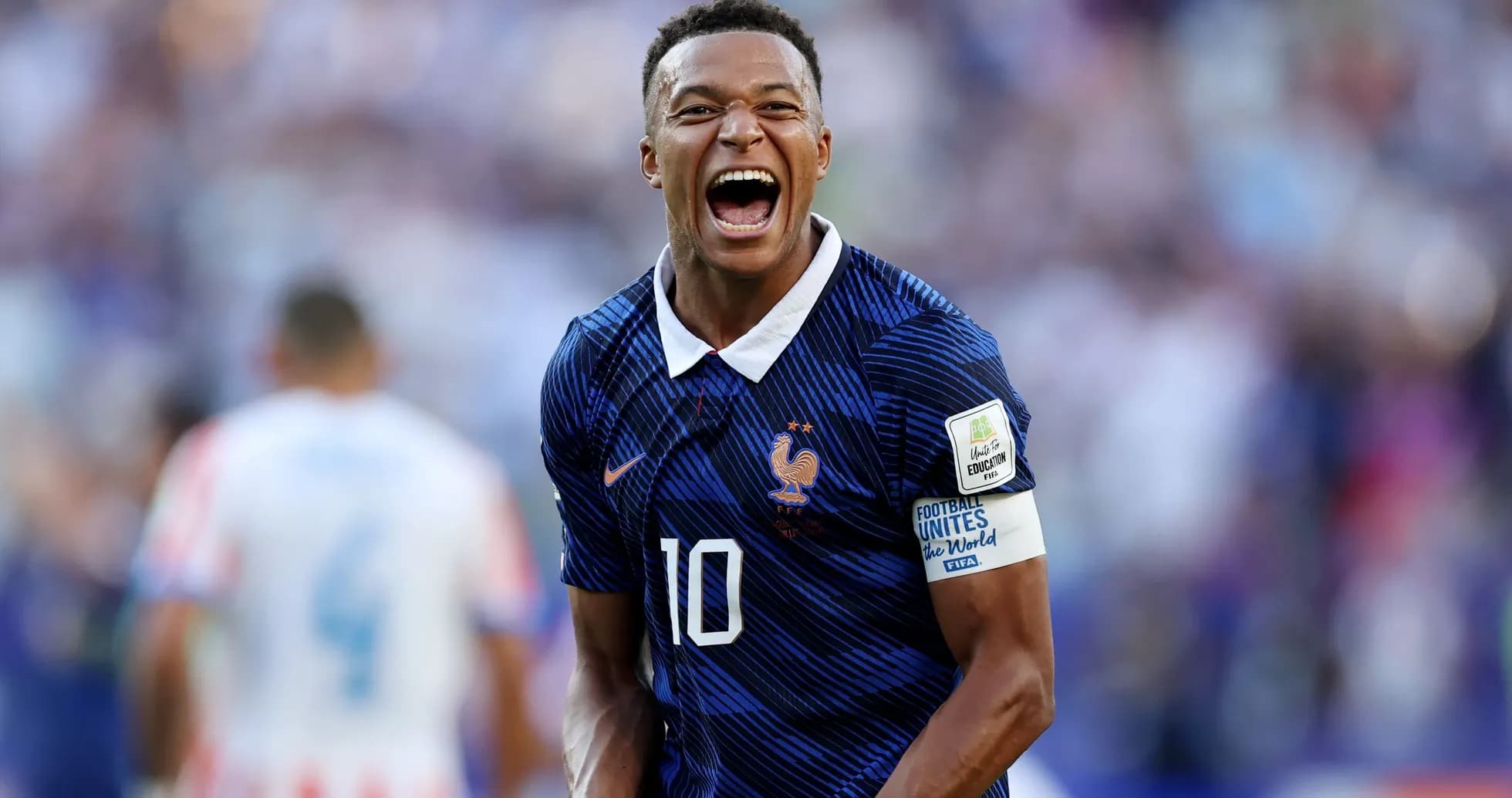 Player celebrating during match wearing France jersey Player celebrating during match wearing France jersey