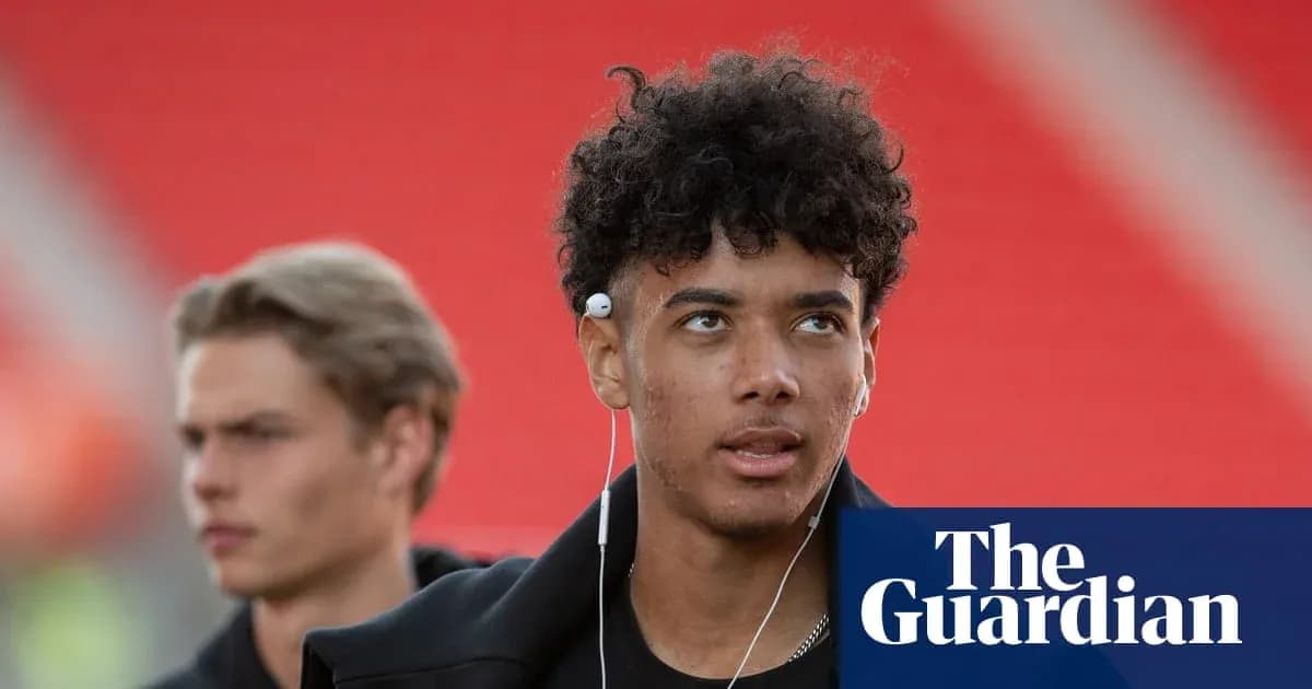 Two young men walking in stadium before match Two young men walking in stadium before match