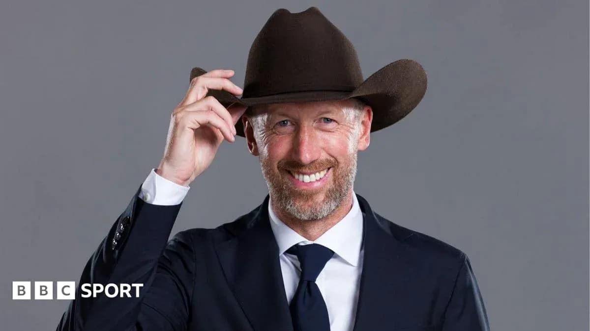 Man in a suit tipping his cowboy hat Man in a suit tipping his cowboy hat