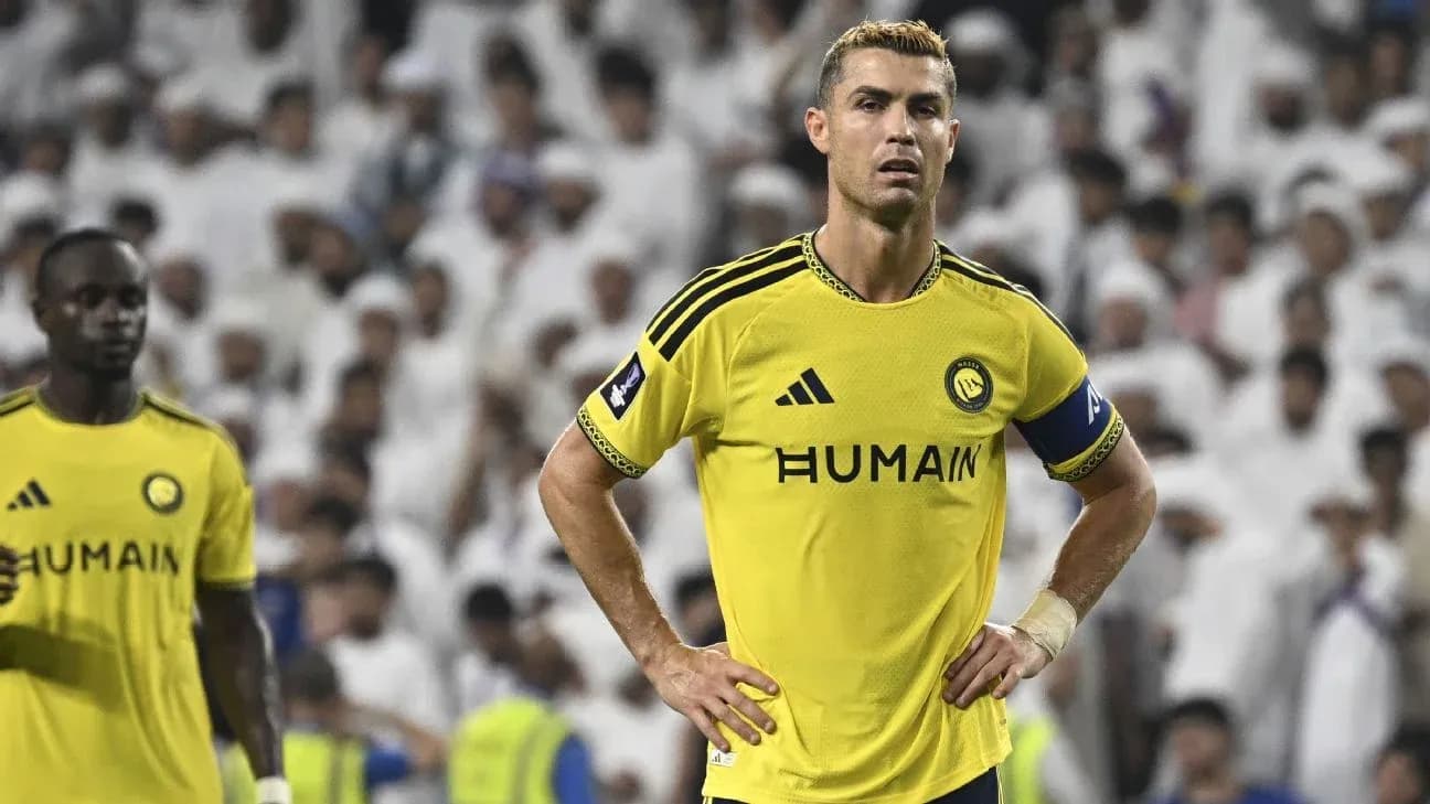 Cristiano Ronaldo in yellow kit during match Cristiano Ronaldo in yellow kit during match