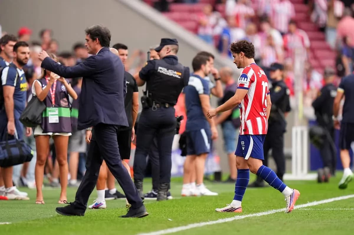 Manager interacting with player on the field Manager interacting with player on the field