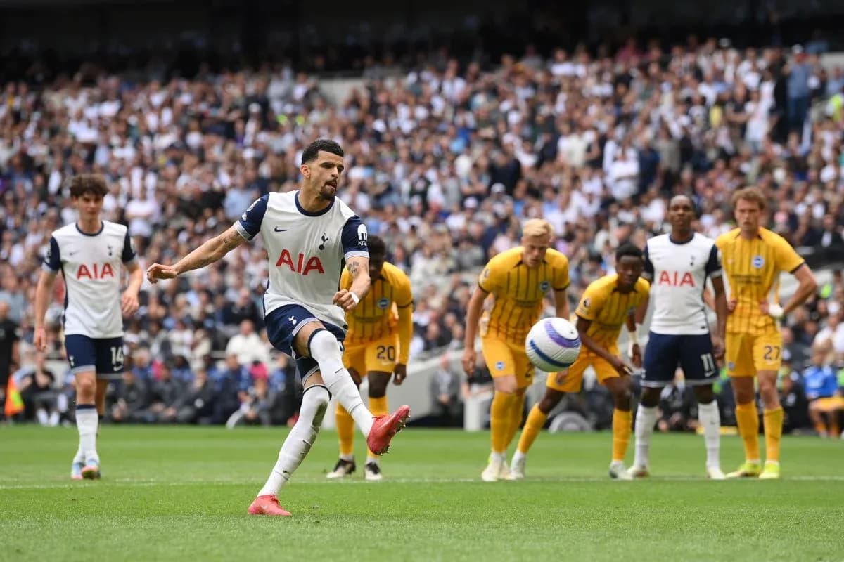 Tottenham player taking a penalty kick Tottenham player taking a penalty kick