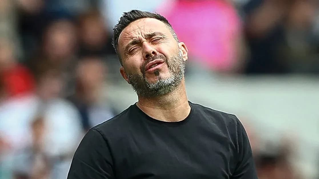 Coach reacting during a match on the sidelines Coach reacting during a match on the sidelines