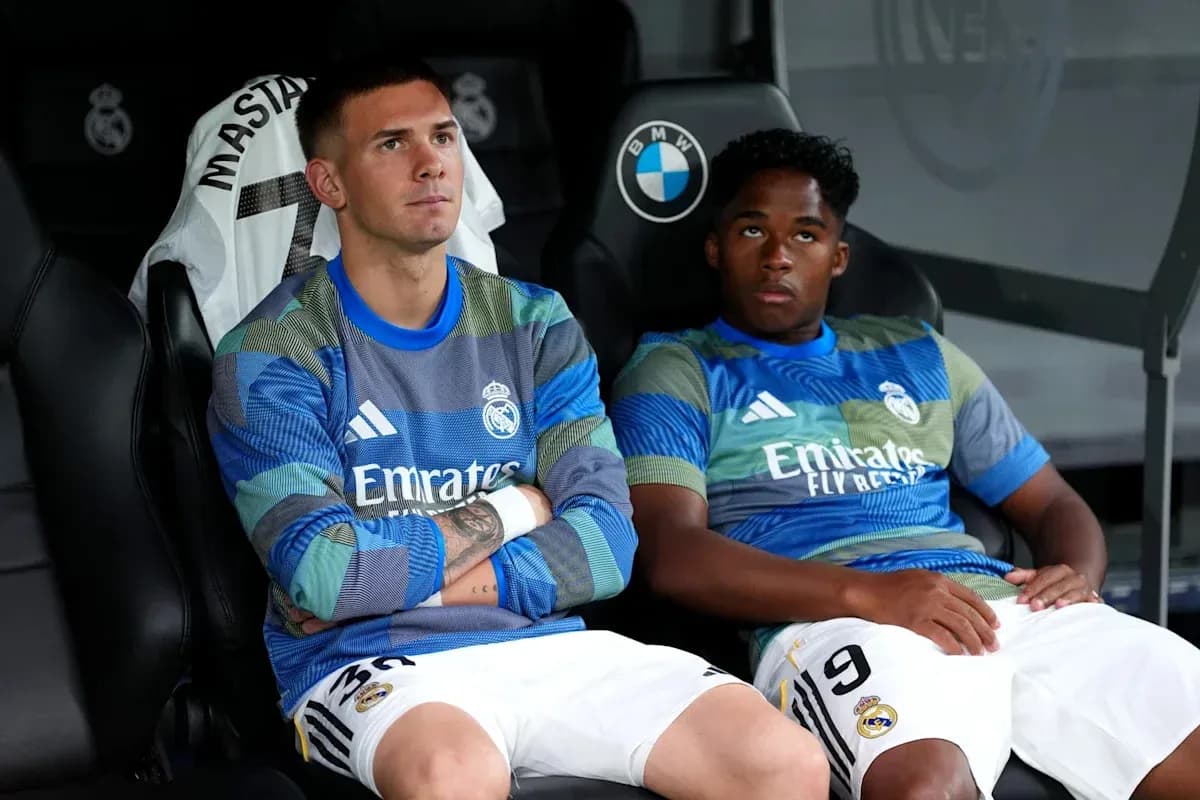 Real Madrid players seated on the bench during match Real Madrid players seated on the bench during match