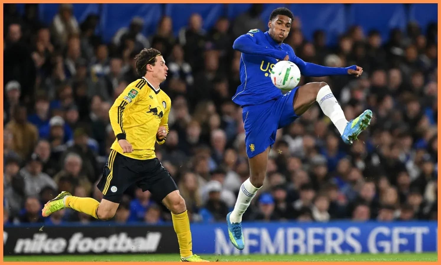 Player kicking the ball during a match Player kicking the ball during a match