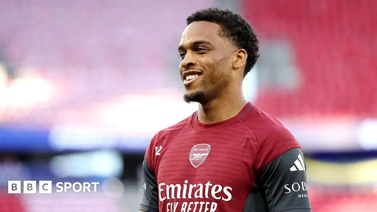 Player in Arsenal kit smiling during warm-up Player in Arsenal kit smiling during warm-up