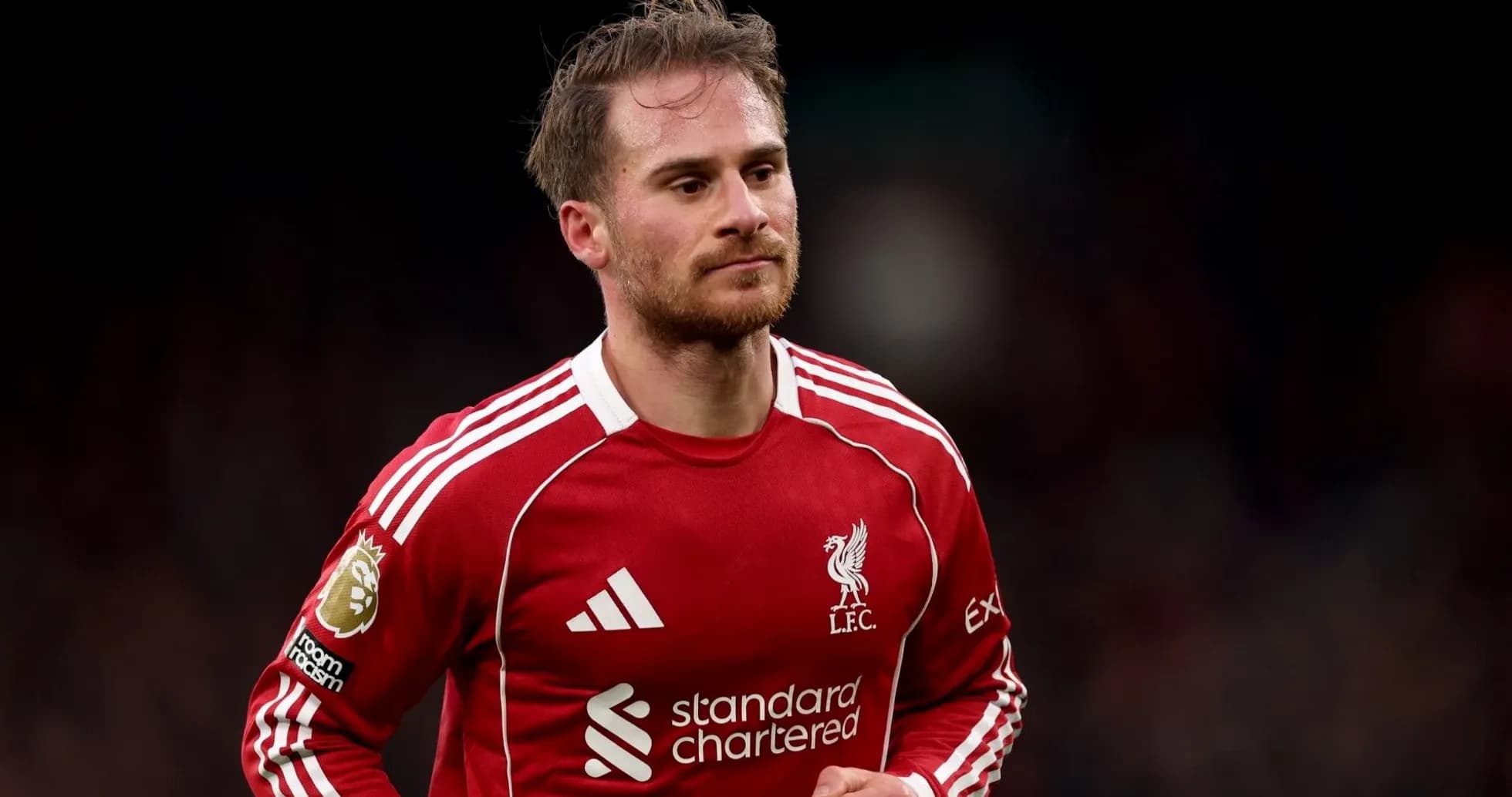 Player in Liverpool FC kit during match Player in Liverpool FC kit during match