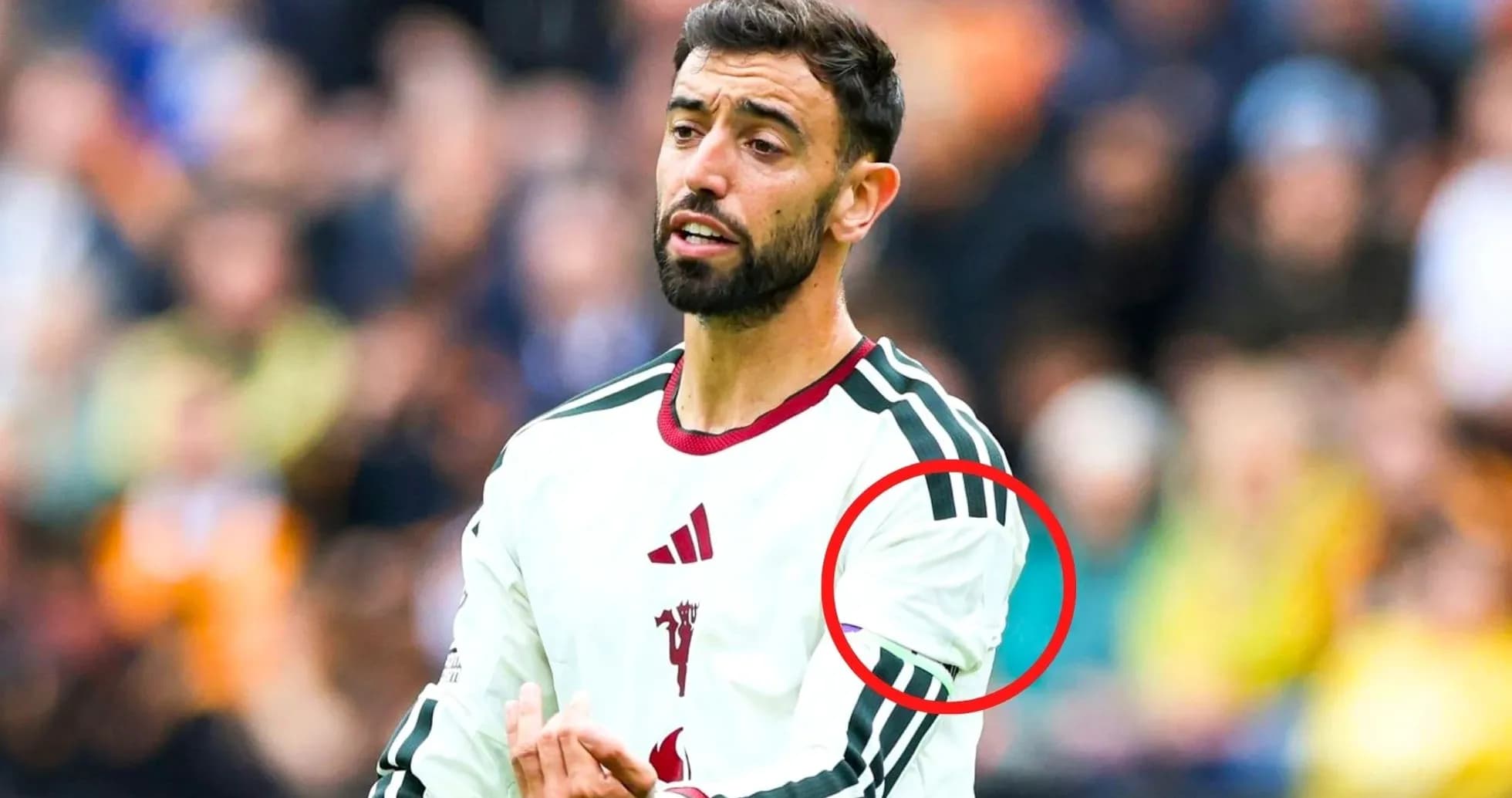 Player gesturing during match, wearing team jersey Player gesturing during match, wearing team jersey