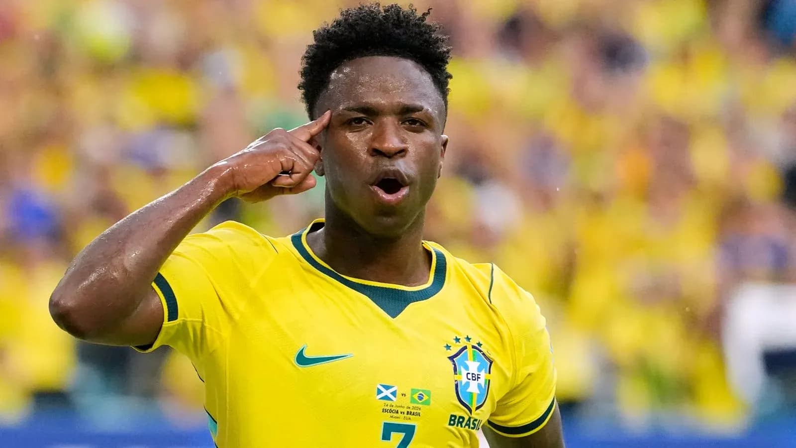 Player celebrating with hand gesture on field Player celebrating with hand gesture on field