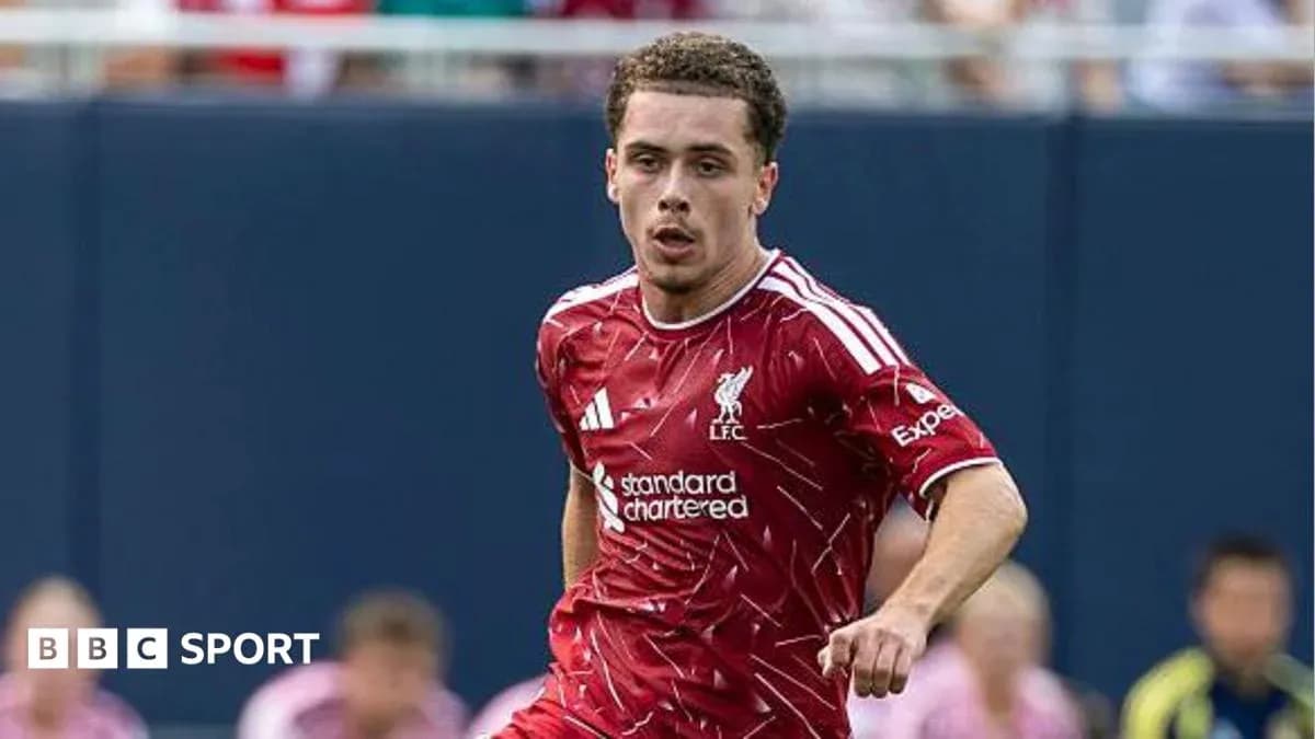 Liverpool player sprinting during a match Liverpool player sprinting during a match