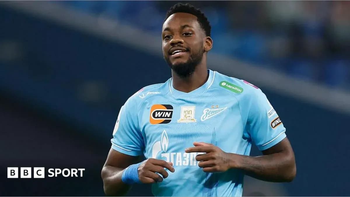 Player in blue jersey smiling during match Player in blue jersey smiling during match