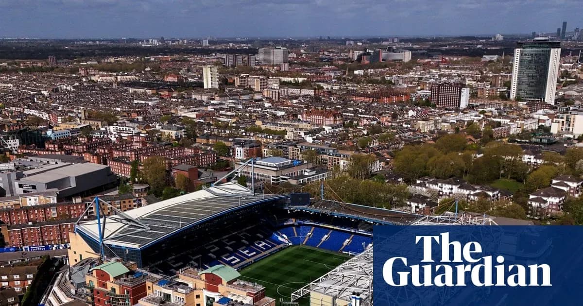 Aerial view of a football stadium and cityscape Aerial view of a football stadium and cityscape