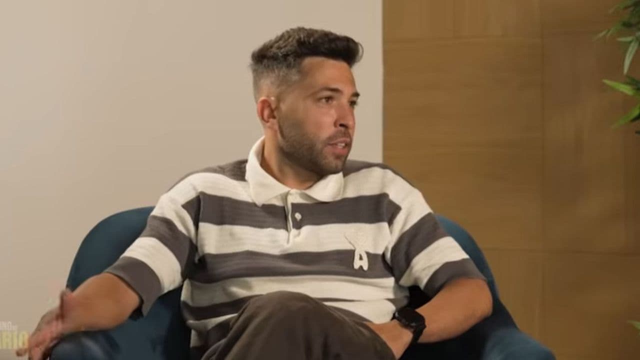 Man in striped shirt speaking during interview Man in striped shirt speaking during interview