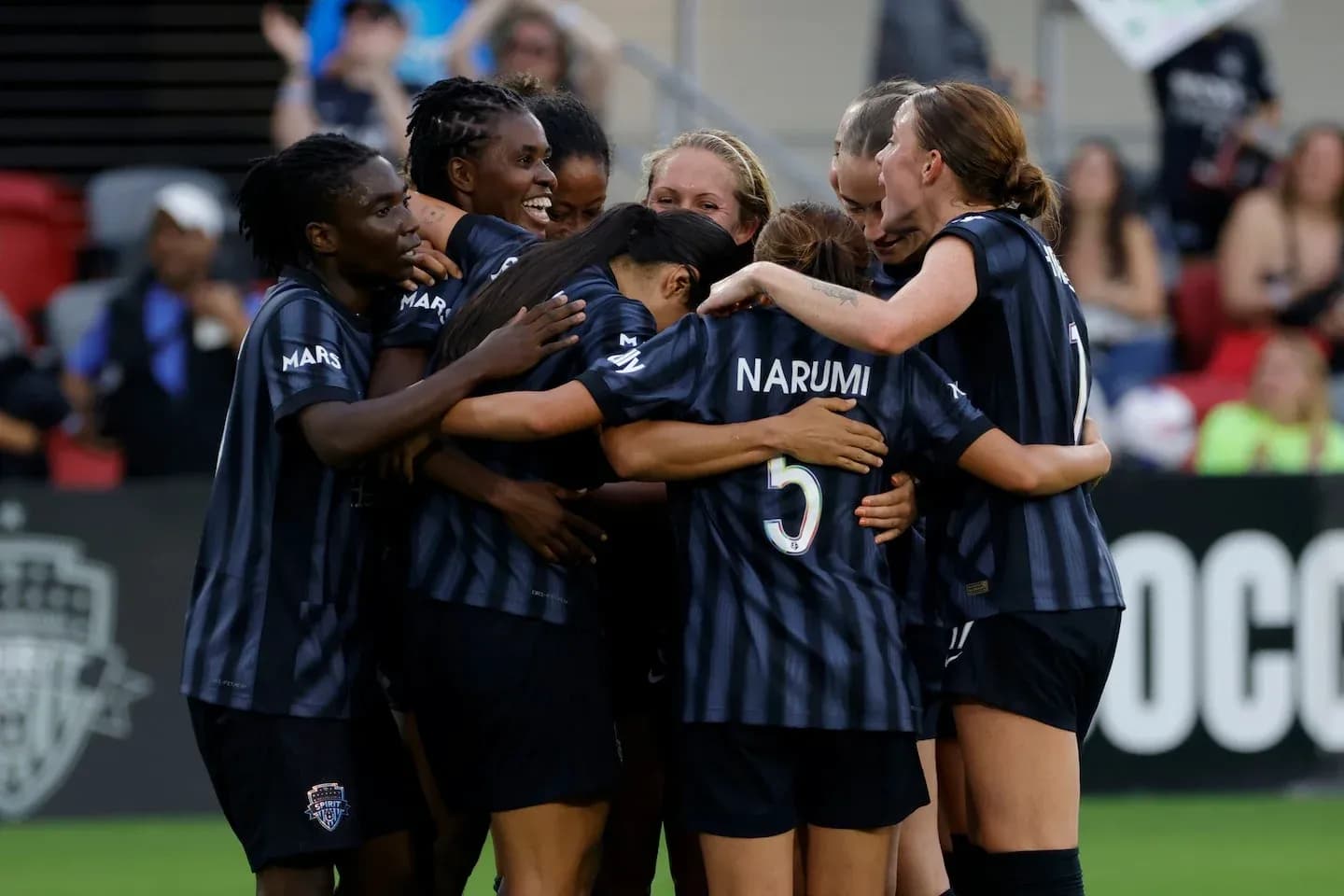 Washington Spirit players celebrating a goal Washington Spirit players celebrating a goal