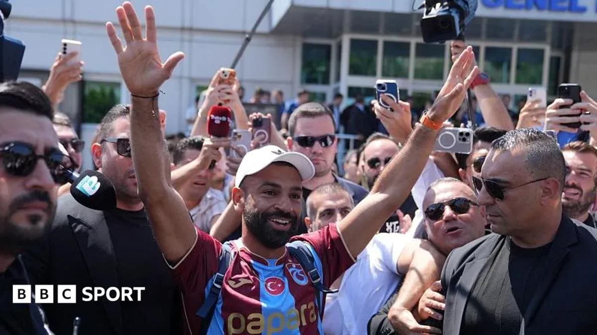 Football player greeting fans during arrival event Football player greeting fans during arrival event
