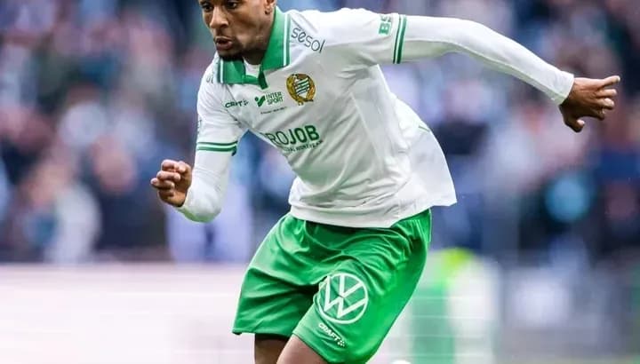 Player sprinting during a football match Player sprinting during a football match