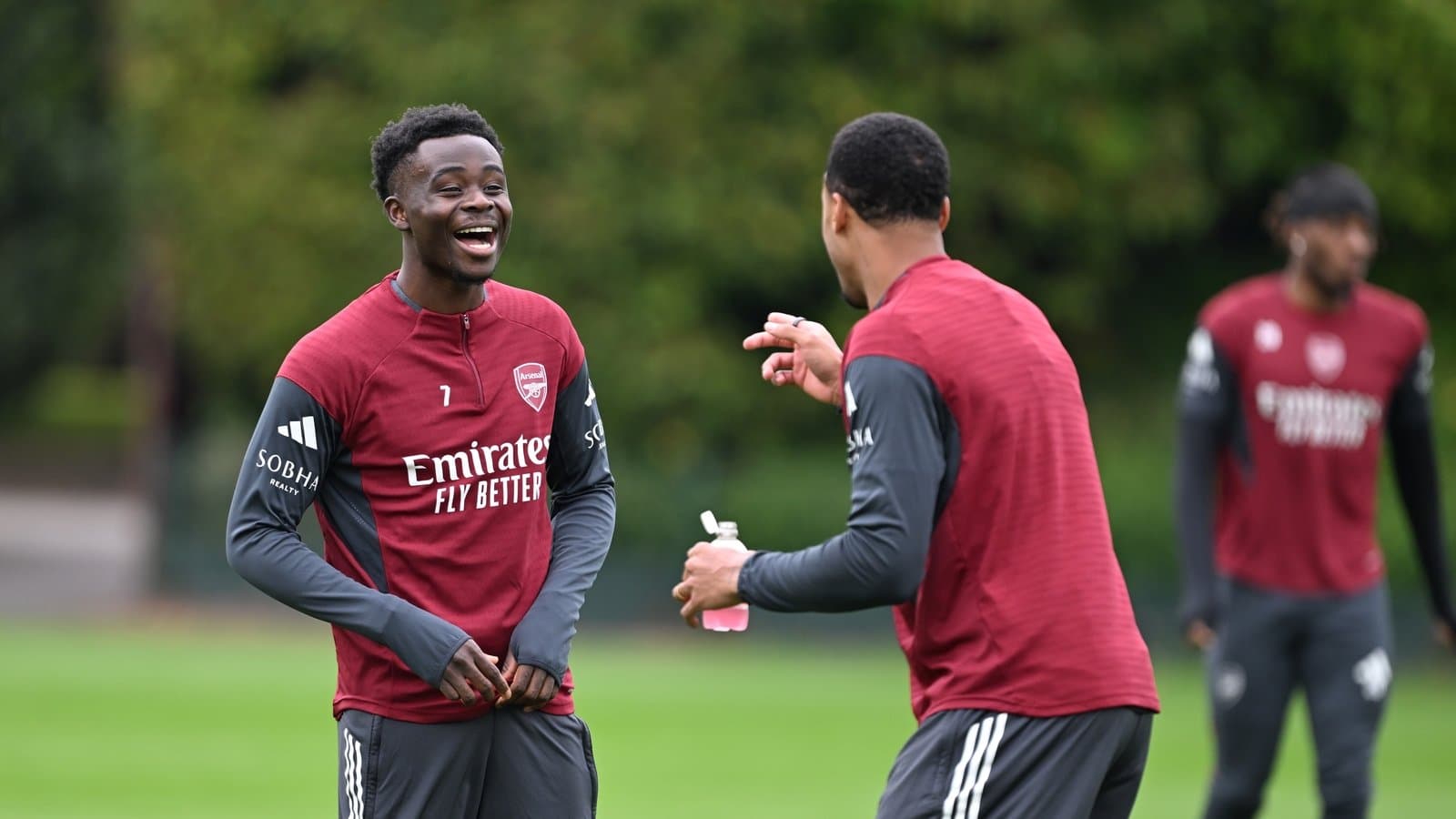 Players laughing during Arsenal training session Players laughing during Arsenal training session