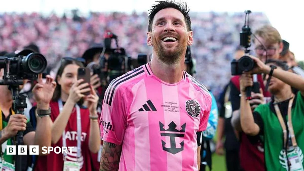 Lionel Messi smiling surrounded by photographers Lionel Messi smiling surrounded by photographers