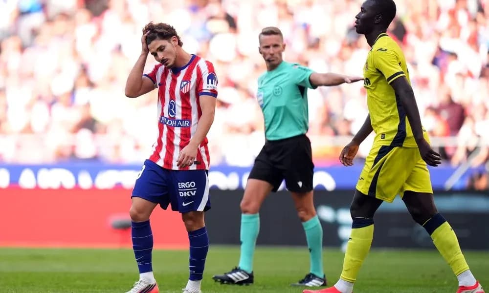 Player from Atlético Madrid shows frustration during match Player from Atlético Madrid shows frustration during match