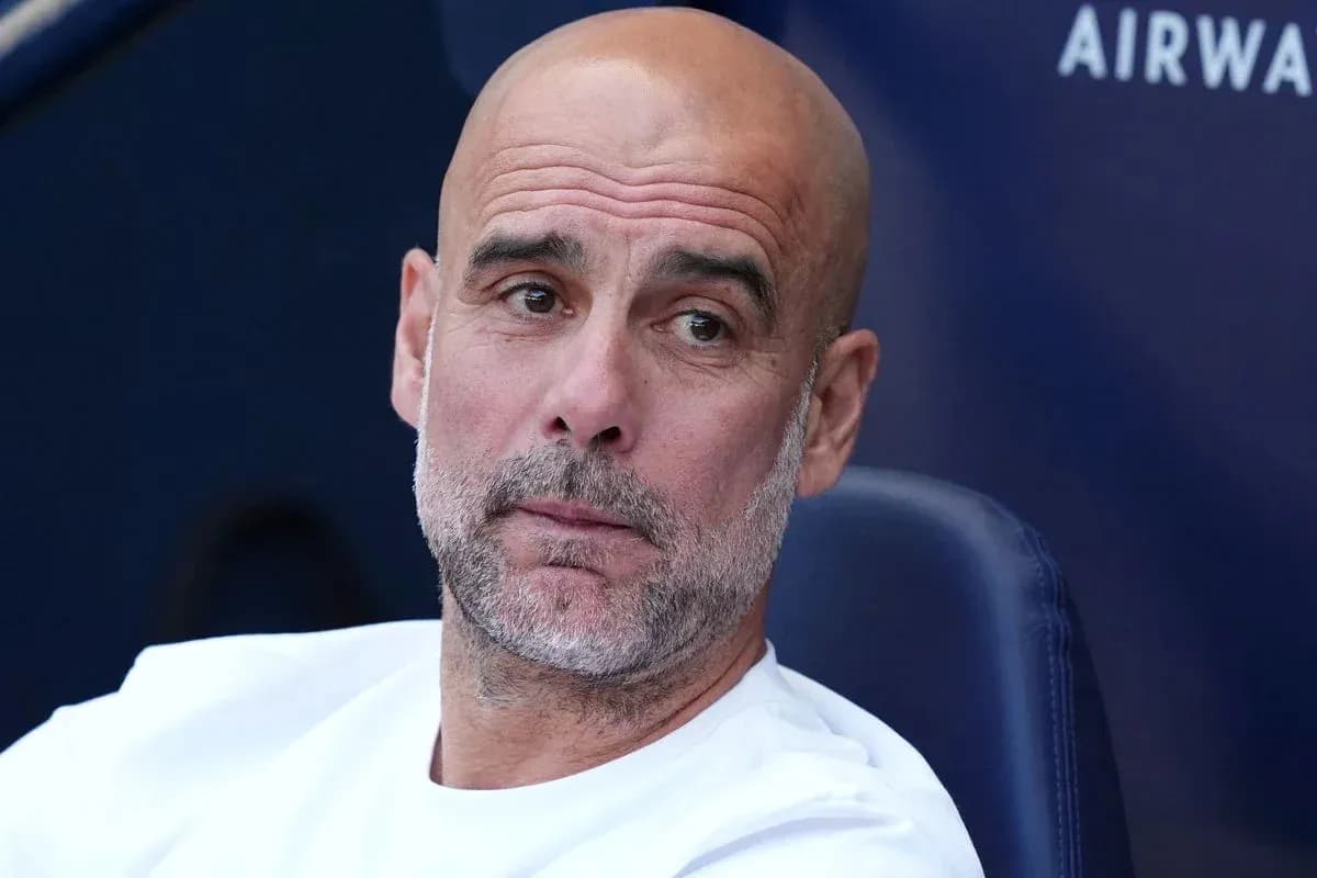 Coach sitting on bench during match Coach sitting on bench during match