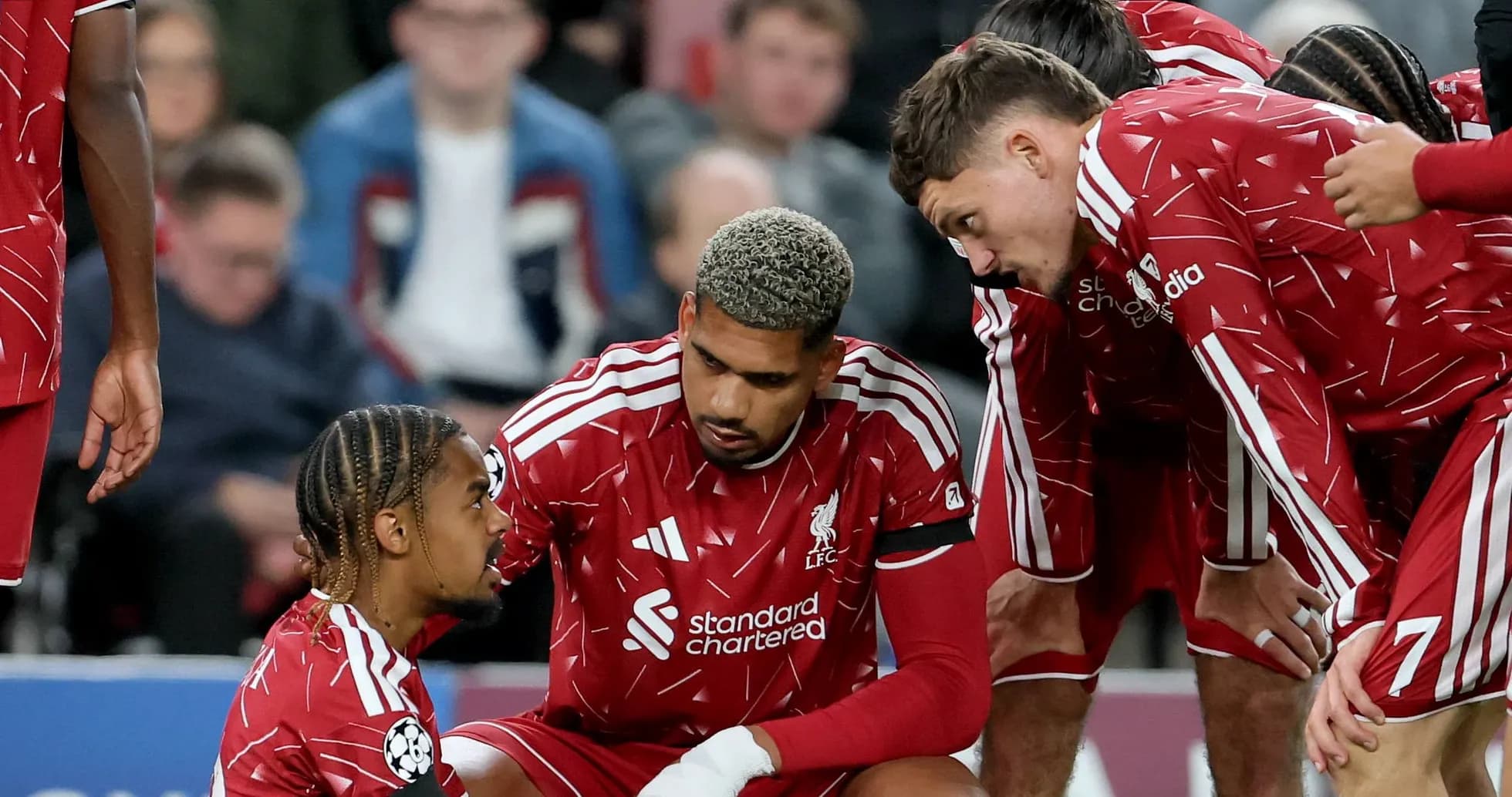 Liverpool players discussing during a match timeout Liverpool players discussing during a match timeout