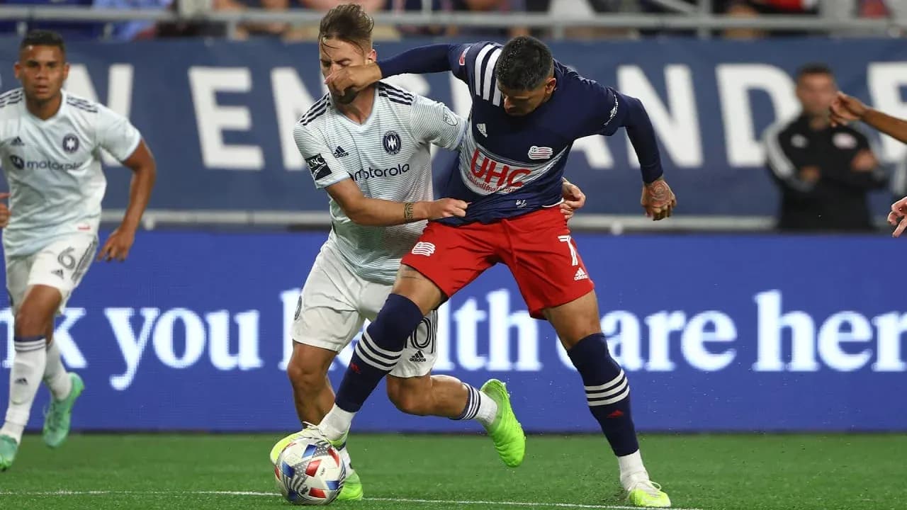 New England II player battling Chicago Fire II opponent New England II player battling Chicago Fire II opponent